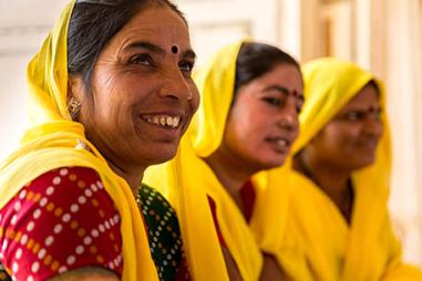 photograph of Indian women in bright colours