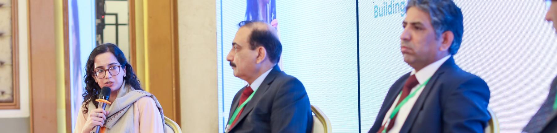 Photo showing panelists at the 2nd National Social Protection Conference in Pakistan: From left to right – Maheen Zahra (Senior Consultant, Poverty and Social Protection, Dr. Muhammad Nadeem Memon (Joint Secretary, Finance Division, Government of Pakistan), Mr. Mohammad Taufique (Additional Secretary, Planning and Development Department, Khyber Pakhtunkhwa)