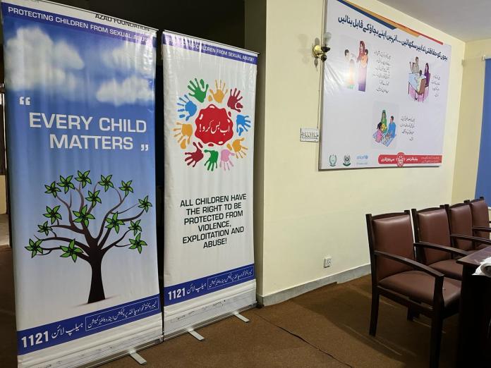 Photo of room with posters on the wall with 'Every Child Matters' written on one and 'All children have the right to be protected from violence, exploitation and abuse on another.