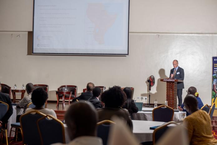 OPM CEO, Mark Henstridge presenting at an event in Kenya